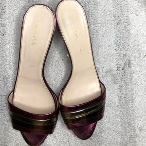 Prada purple and gold patent leather peep toe kitten heels.